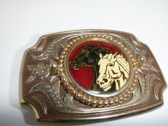 1980s HORSES BLACK & WHITE BELT BUCKLE MADE USA GOLD METAL RESIN VINTAGE