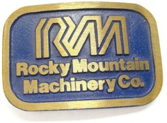 RM Rocky Mountain Machinery Co Blue & Gold Tone Belt Buckle Dynabuckle Utah