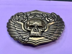 Dimensional Skull Head With Wings And Flowers – Raised Metal Belt Buckle