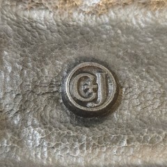 Belt Buckle – C+J Inc. 1990 Snowmobiler (with wear)