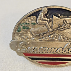 Belt Buckle – C+J Inc. 1990 Snowmobiler (with wear)