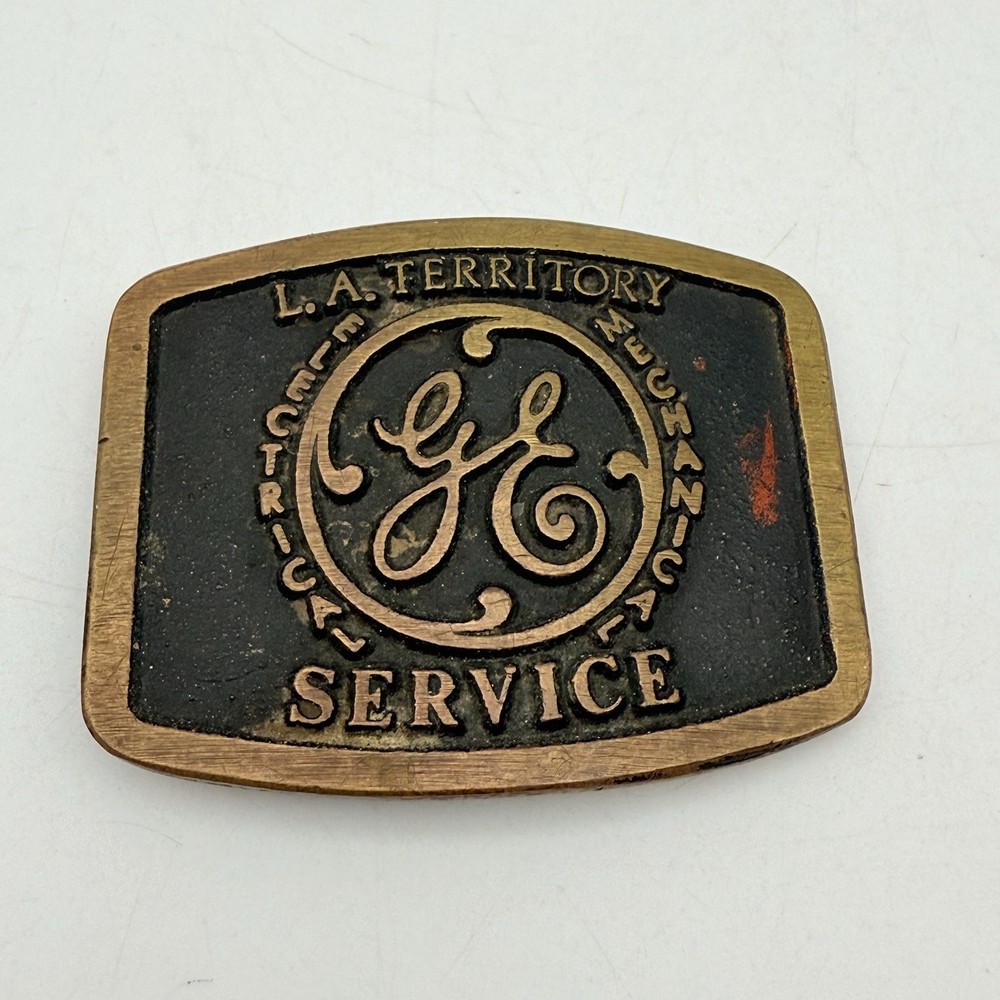 vintage 1970s western GE belt buckle SOLID BRASS cowboy “LA TERRITORY”
