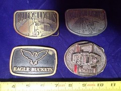 Lot of (4) Trucker Belt Buckles Eagle Buckets Raleigh Lights Power Take Off&rsquo;s