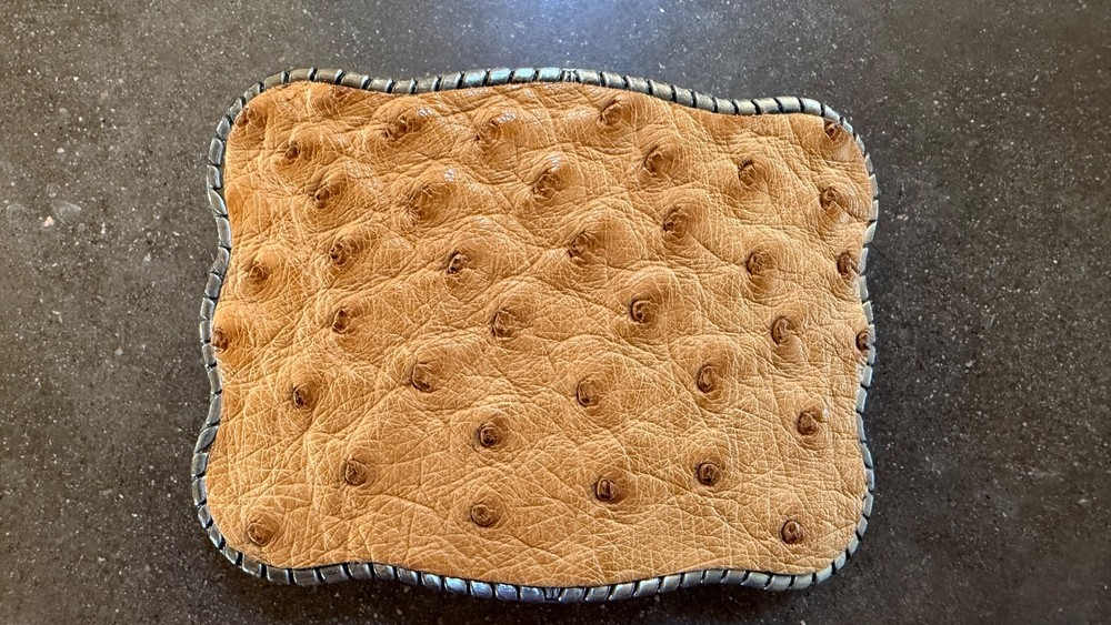BUCKLE WALLET. TAN OSTRICH HIDE. TITANIUM ROPE EDGING.HOLDS ID, CREDIT CARDS, $.