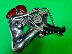 Woman Hugging V-Twin Engine with Red Enamel Hair Novelty Figural Belt Buckle