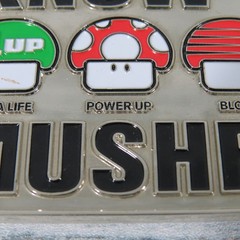 2004 Nintendo Know Your Mushrooms Super Mario Belt Buckle