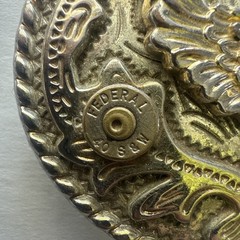 VINTAGE AMERICAN EAGLE BELT BUCKLE WITH HORNADY 12 AND 2 S&W 40 SHELLS