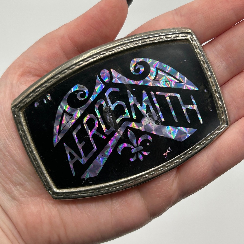 Vintage 80s Aerosmith Prism Brass Band Belt Buckle Holographic Fleur De Lis Rock
