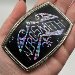 Vintage 80s Aerosmith Prism Brass Band Belt Buckle Holographic Fleur De Lis Rock