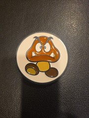 2012 SUPER MARIO BROTHERS GOOMBA BELT BUCKLE NINTENDO LICENSED