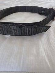 Bison Designs Tap Cap 38 mm belt featuring a gunmetal-colored bottle opener
