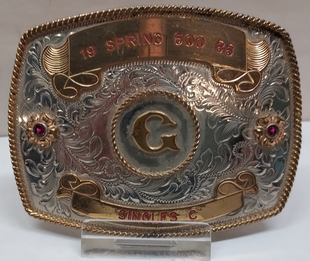 1986 – SPRING 500 – SINGLES C – GERMAN SILVER – BELT BUCKLE – listing # 9560