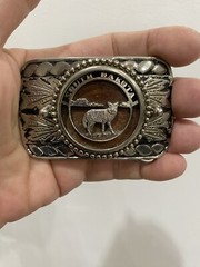 SOUTH DAKOTA State belt buckle silver toned with wooden background Disk 3d wolf