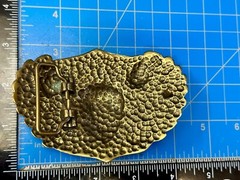 Dimensional Skull Head With Wings And Flowers – Raised Metal Belt Buckle