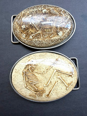 TWO SILVER TONE METAL MOMENTO MORI SKELETON BELT BUCKLES