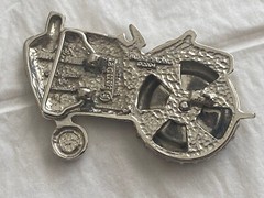 2004 Olander silver tractor belt buckle spinning back wheel