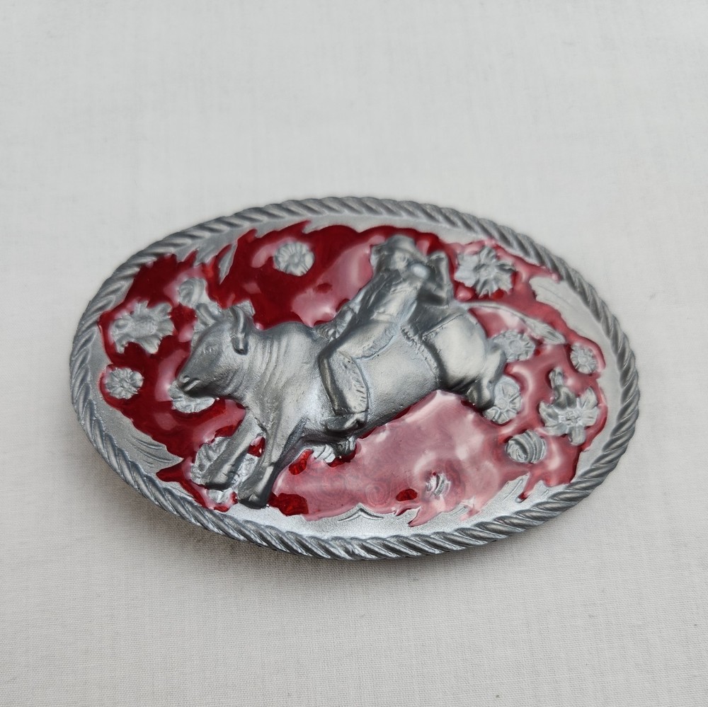 Vintage Bull Riding Rodeo Grey Oval Belt Buckle 1986 Red Painted Background