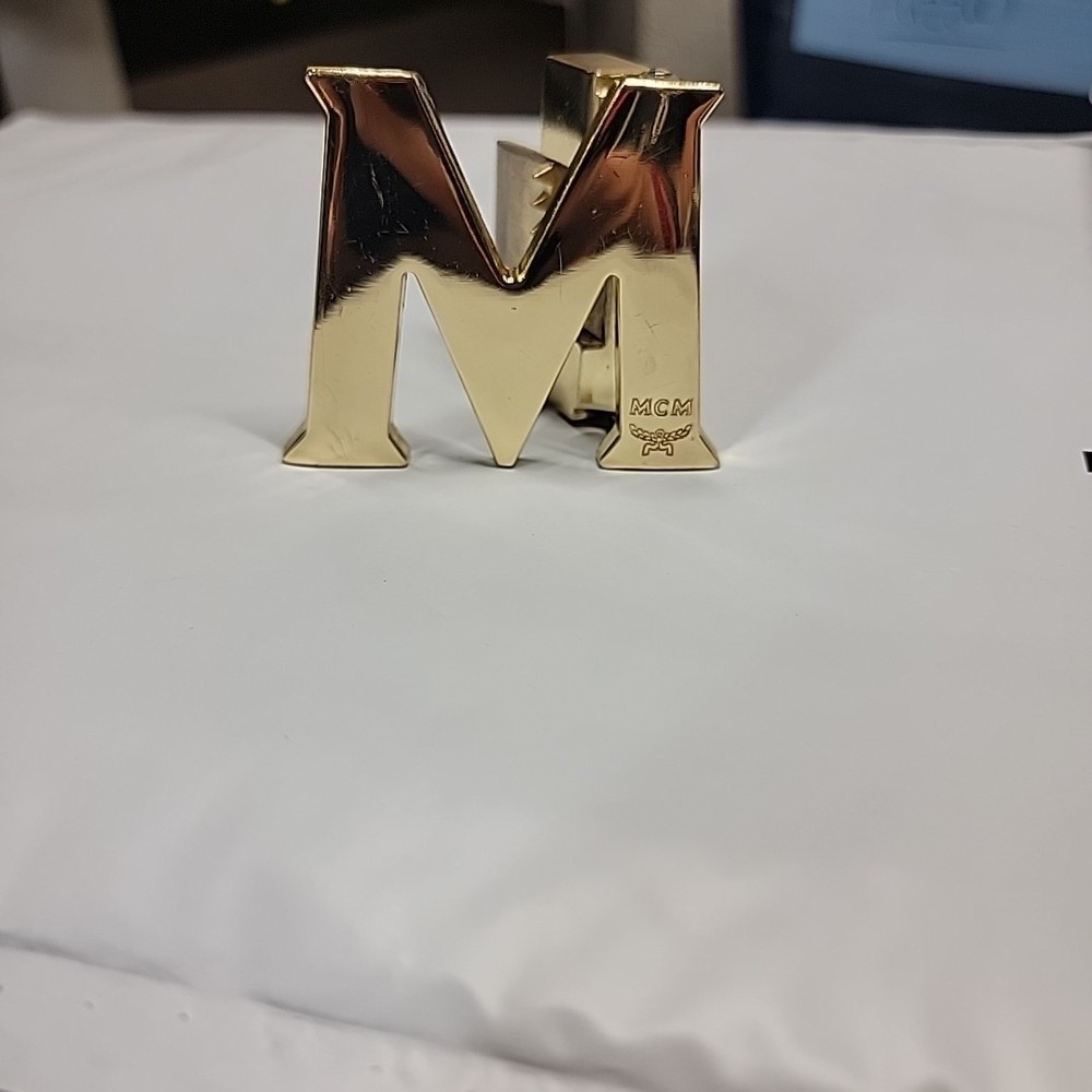 MCM gold logo reversible Belt Buckle Clean Not Too Bad Condition.