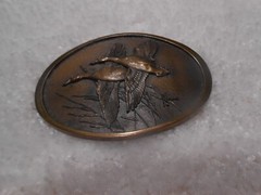 Wild Wings Inc. Lake City, Minnesota 55041 Brass Ducks Belt Buckle