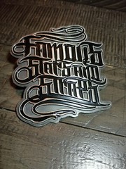FAMOUS STARS & STRAPS BELT BUCKLE
