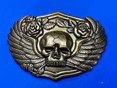 Dimensional Skull Head With Wings And Flowers – Raised Metal Belt Buckle