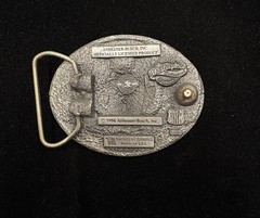 Vintage oval belt buckle featuring a detailed relief of red wolf head RARE