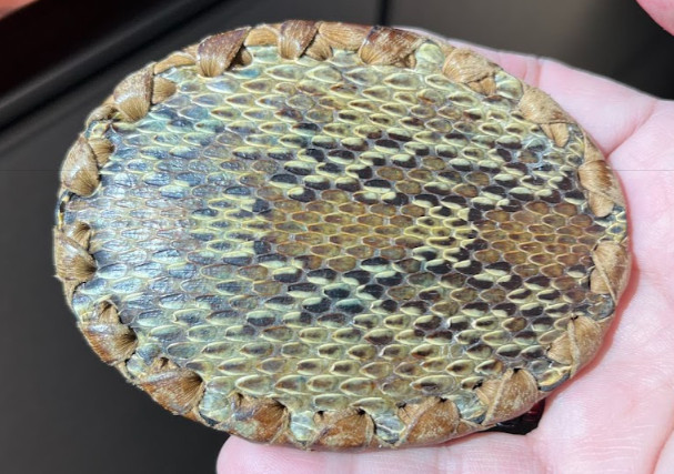 Trevino&rsquo;s snakeskin belt buckle