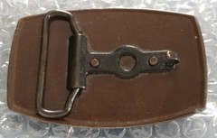 LONG HAIR DOG LHASA APSO ON A RED LEATHER PIECE SET ON A BELT BUCKLE