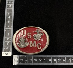 Vintage USMC belt buckle features red enamel background “First to Fight” RARE