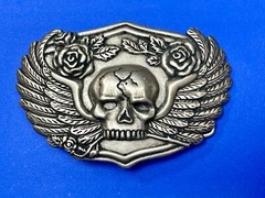 Dimensional Skull Head With Wings And Flowers – Raised Belt Buckle