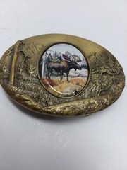Artistic impression MOOSE belt buckle designed by Julie Zsupnik, 2004