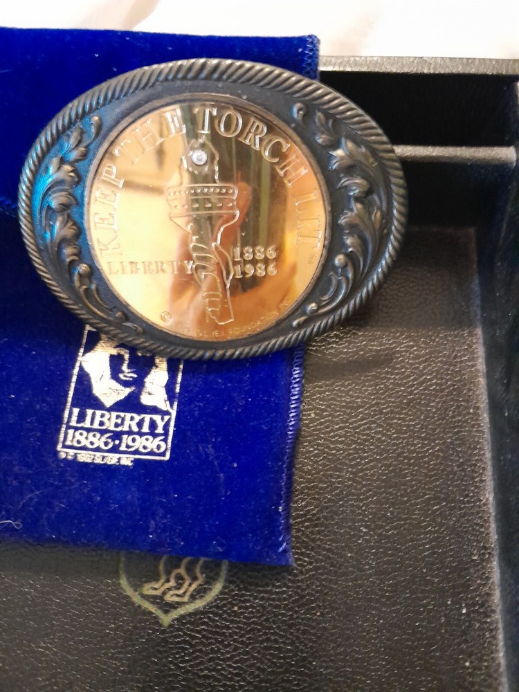 Belt Buckle Mens Keep The Torch Lit 1886 To 1986. Comes With Pouch