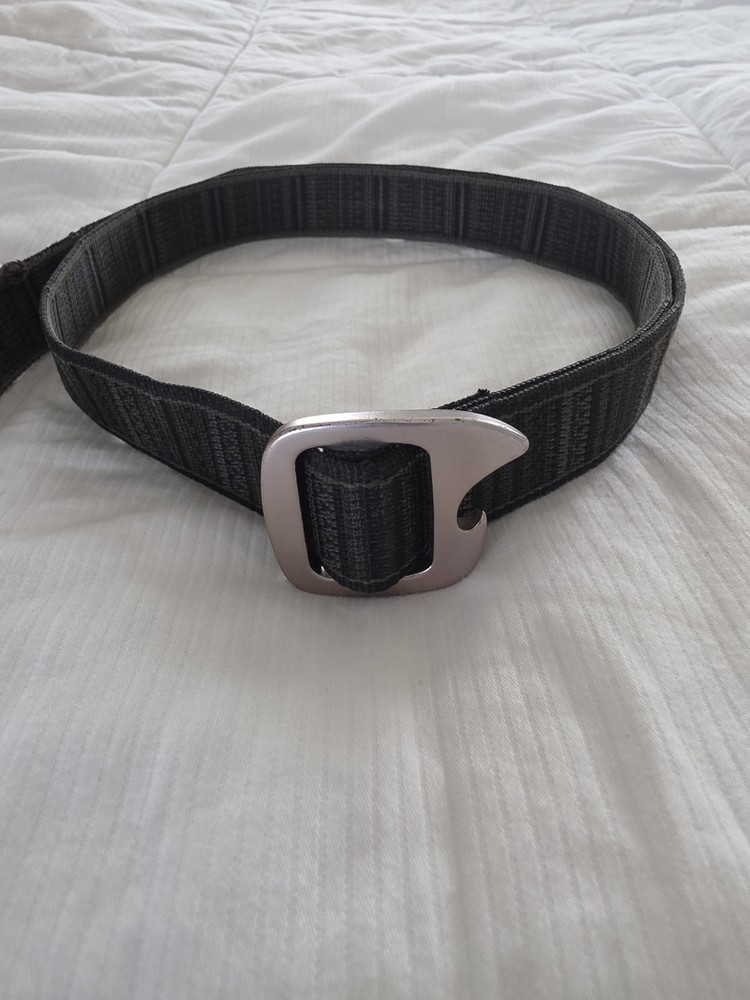 Bison Designs Tap Cap 38 mm belt featuring a gunmetal-colored bottle opener