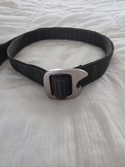 Bison Designs Tap Cap 38 mm belt featuring a gunmetal-colored bottle opener
