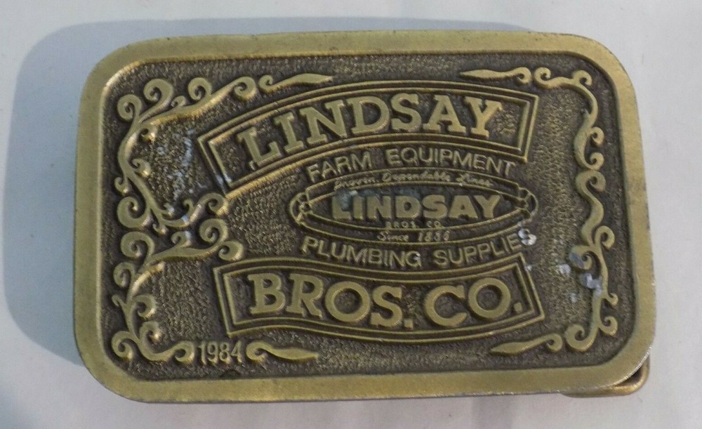 Lindsay Bros Belt Buckle Farming Equipment Plumbing Supply 1984 Hit Line USA