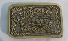 Lindsay Bros Belt Buckle Farming Equipment Plumbing Supply 1984 Hit Line USA