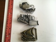 3 Vintage Belt Buckles – Snow Machine, Bull Dozer, Sail Boat – Unused