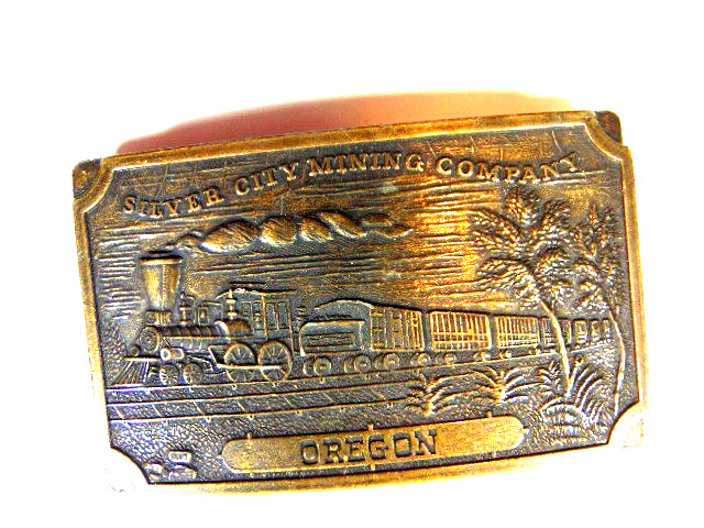 pre-owned brass « Silver City Mining Company Oregon » belt buckle w/ train scene