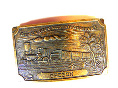 pre-owned brass « Silver City Mining Company Oregon » belt buckle w/ train scene