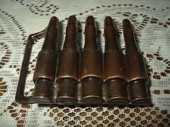 Metal bullet belt buckle copper tone gun ammunition design NEW