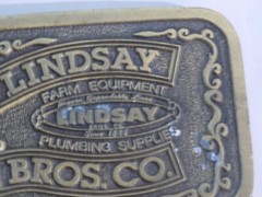 Lindsay Bros Belt Buckle Farming Equipment Plumbing Supply 1984 Hit Line USA