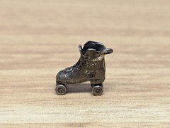Vintage Miniature Roller Skate Shoe Revolver and Sailing Boat Trinkets