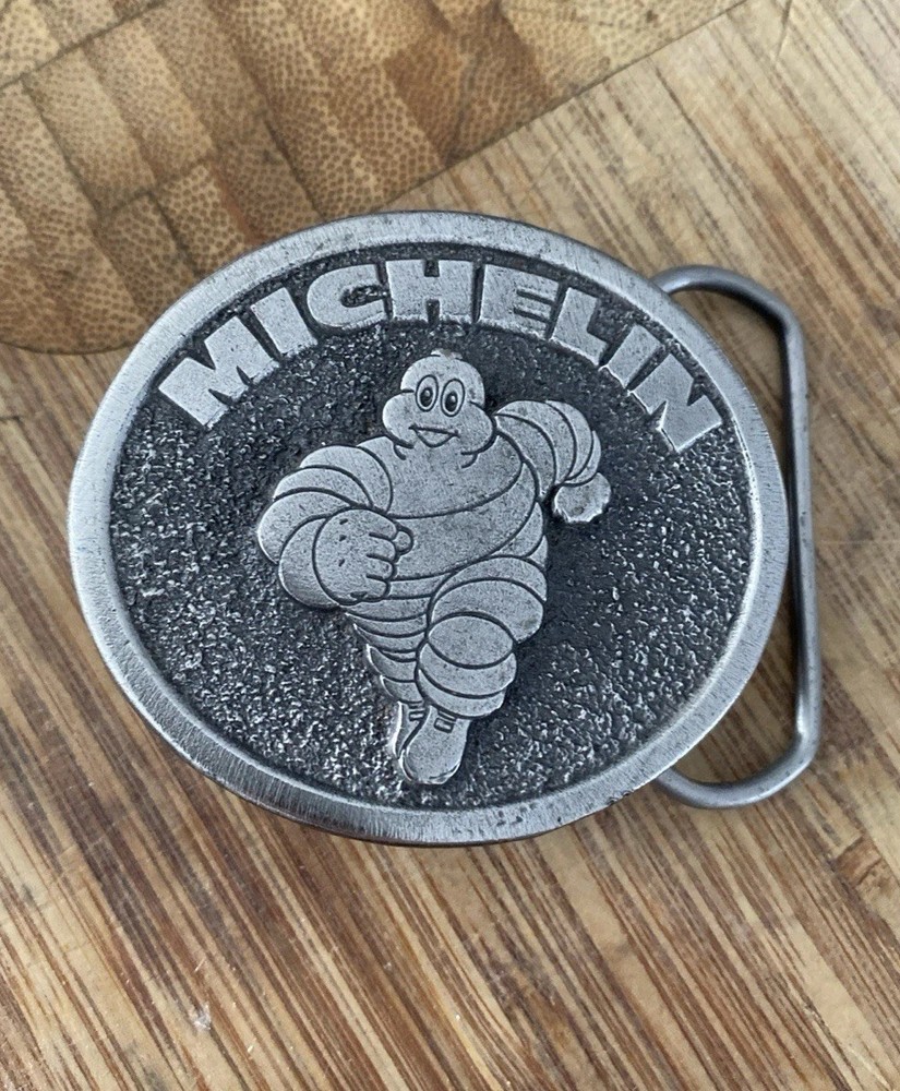 VINTAGE 80’s Michelin Man Tire Belt Buckle Made In USA, Great American Buckle Co