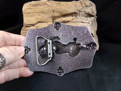 Motorcycle Belt Buckle with the American Flag & 4 Skulls in the middle & ends.