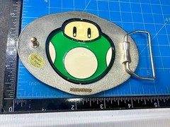Nintendo Super Mario Bros Game Spinning Mushroom Reversible Novelty Belt Buckle