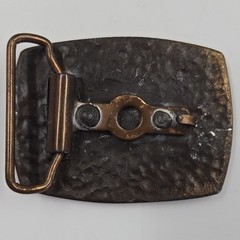 vintage solid brass or bronze novelty belt buckle featuring a roaring cougar