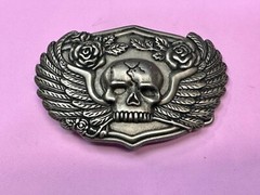 Dimensional Skull Head With Wings And Flowers – Raised Belt Buckle