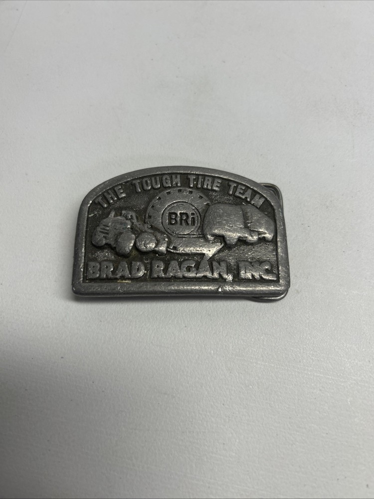 Vintage Brad Ragan Inc. The Tough Tire Team BRi Belt Buckle Metal Illinois
