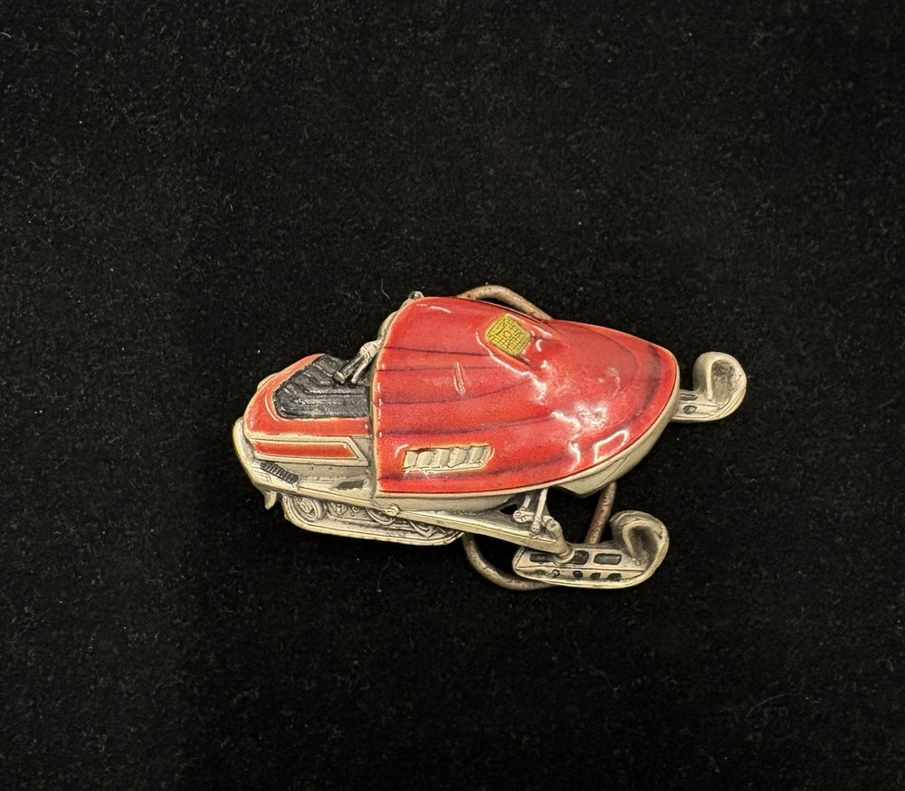 Vintage red and silver snowmobile belt buckle with detailed enamel work RARE