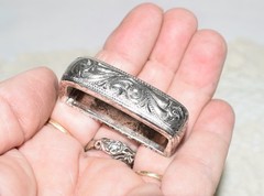 Pre-owned Belt Buckle, Silver in color. 2.5&Prime; x 2.5&Prime; Dated R 1999